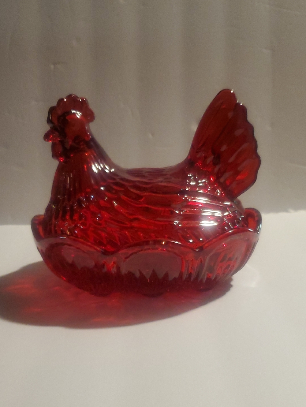 Ruby Red Hen On The Nest